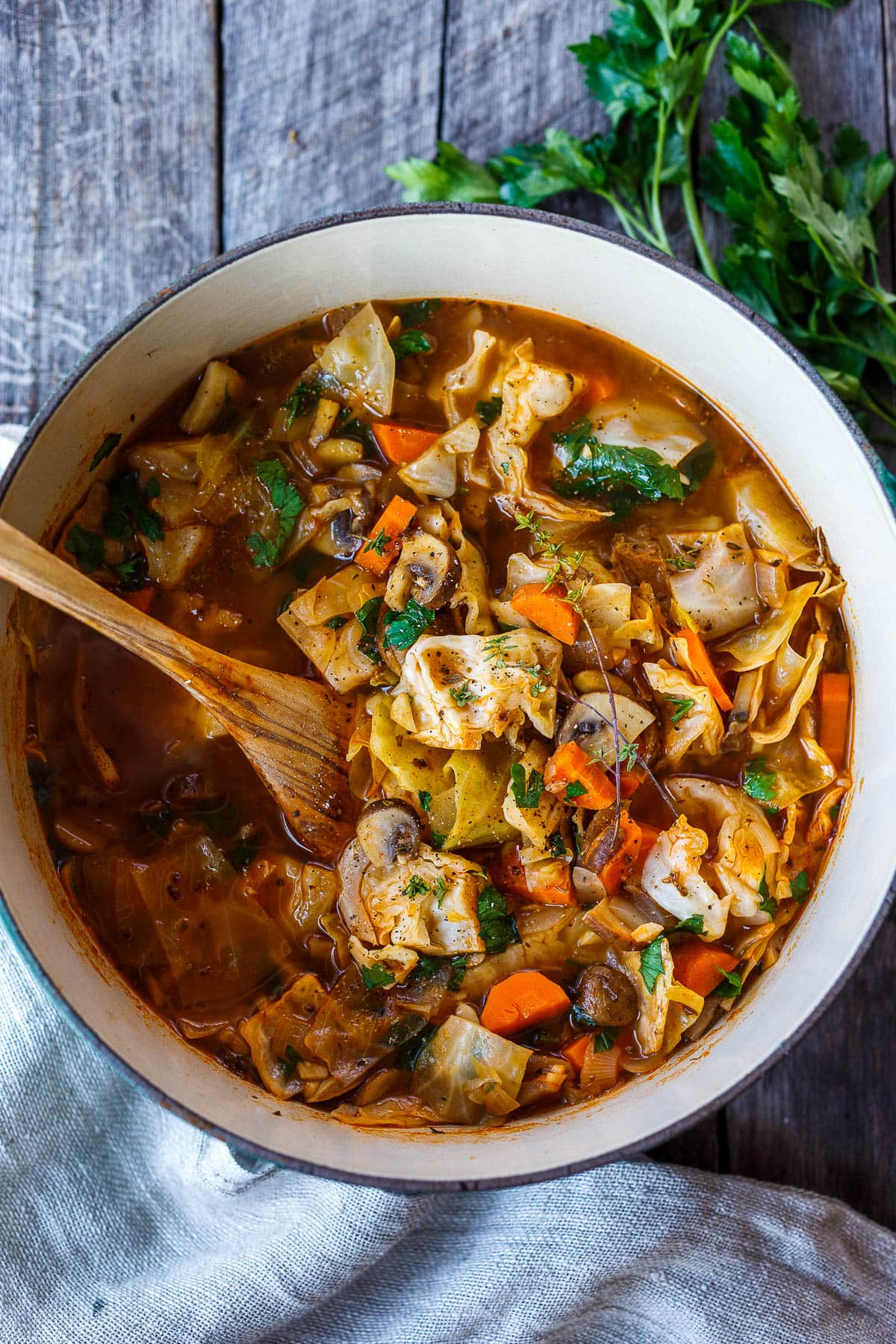 Simple clean ingredients full of comforting flavors, this Cabbage Soup is healthy, satisfying and easy to make.  Perfect for busy weekdays and leftovers are delicious!  Vegan.