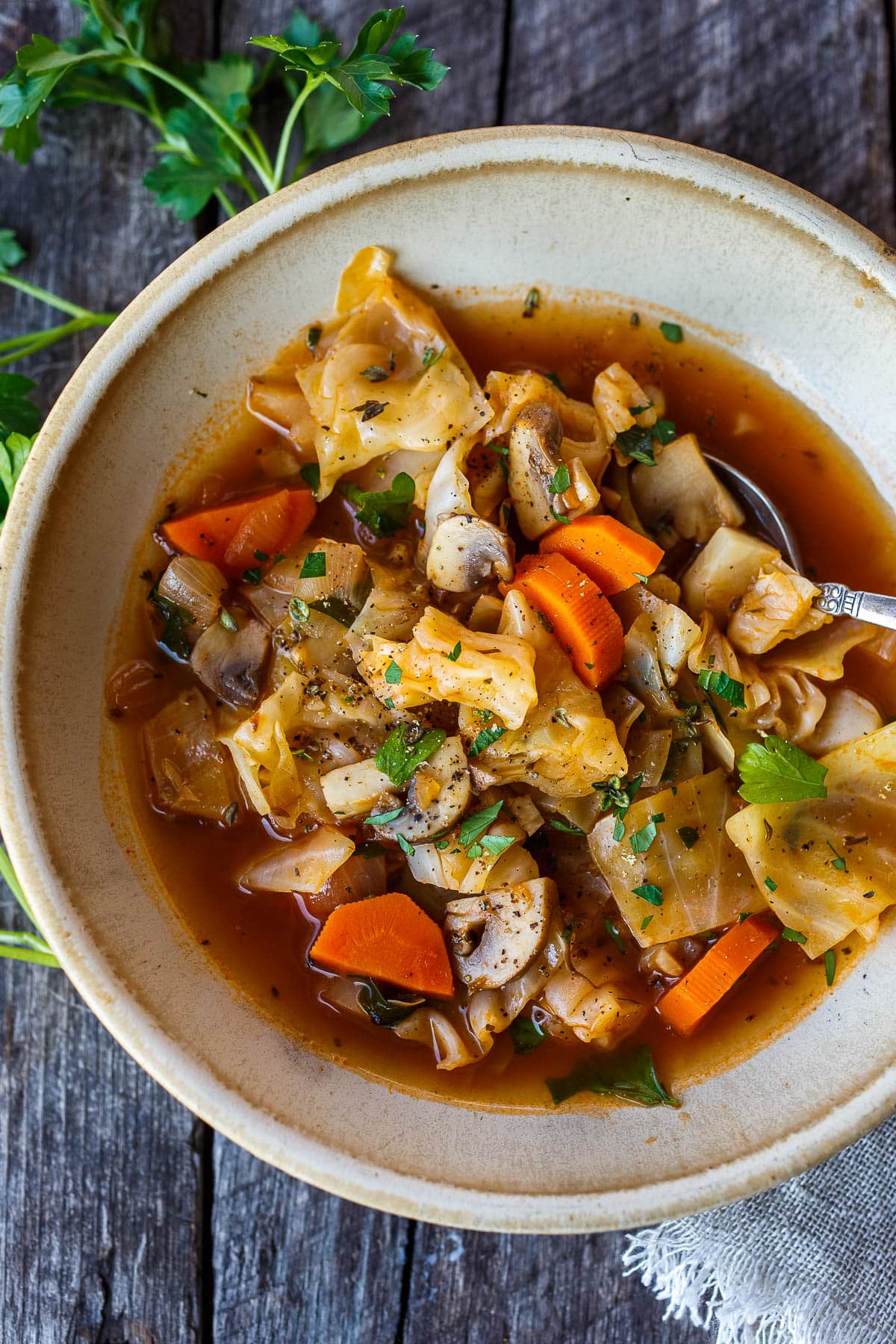 Simple clean ingredients full of comforting flavors, this Cabbage Soup is healthy, satisfying and easy to make.  Perfect for busy weekdays and leftovers are delicious!  Vegan.