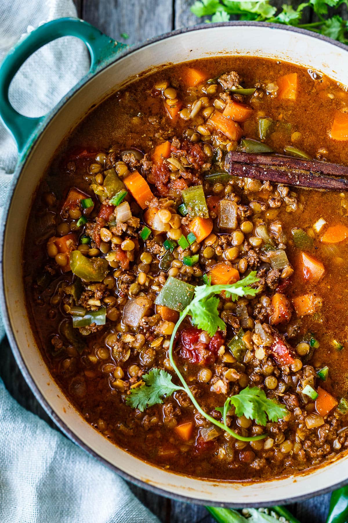 This lentil chili is packed with nutrients and comforting flavor and is perfect for fall, from weeknight dinners to weekend gatherings.  It saves well, and leftovers taste even better!  Vegan adaptable.