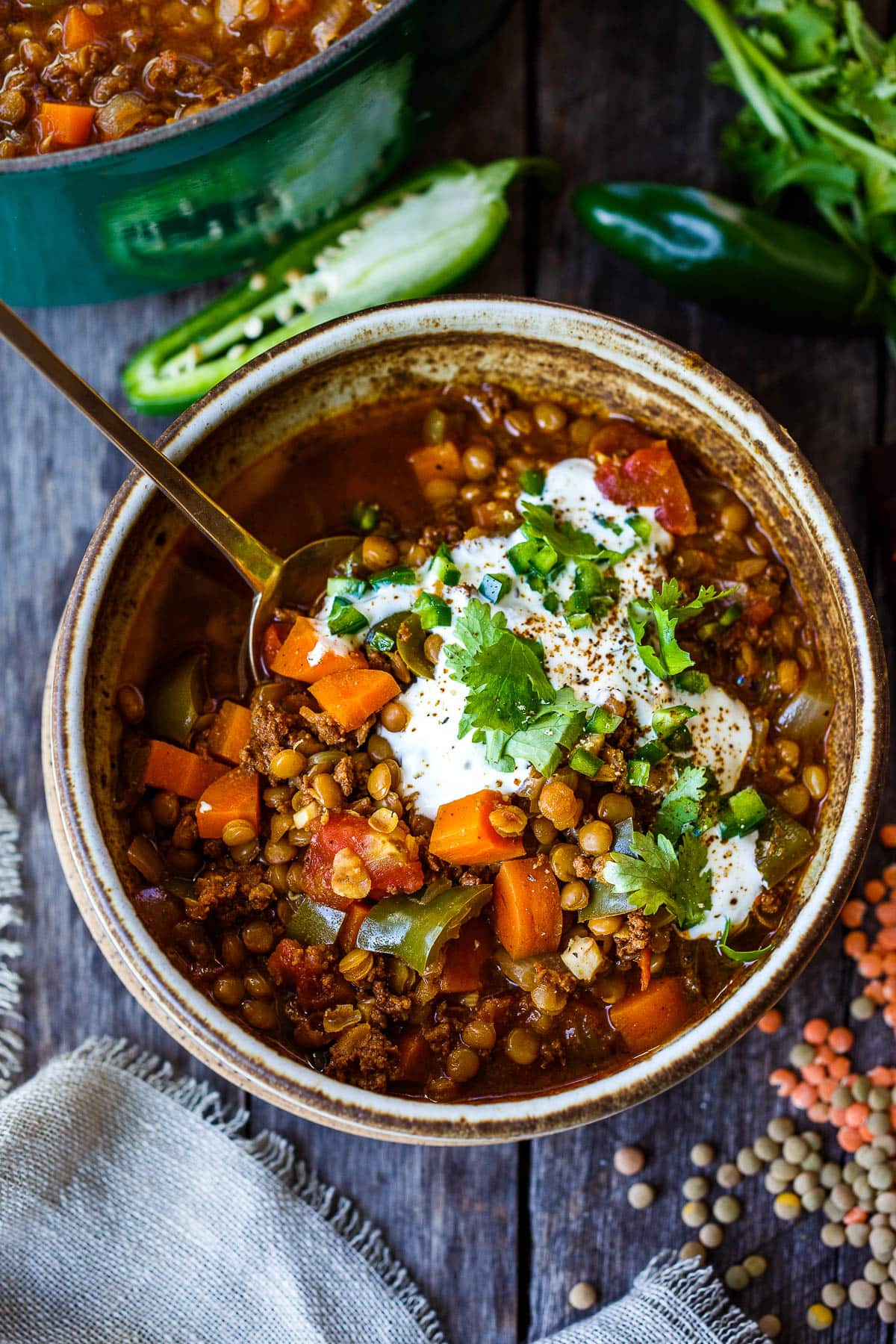 This lentil chili is packed with nutrients and comforting flavor and is perfect for fall, from weeknight dinners to weekend gatherings.  It saves well, and leftovers taste even better!  Vegan adaptable.