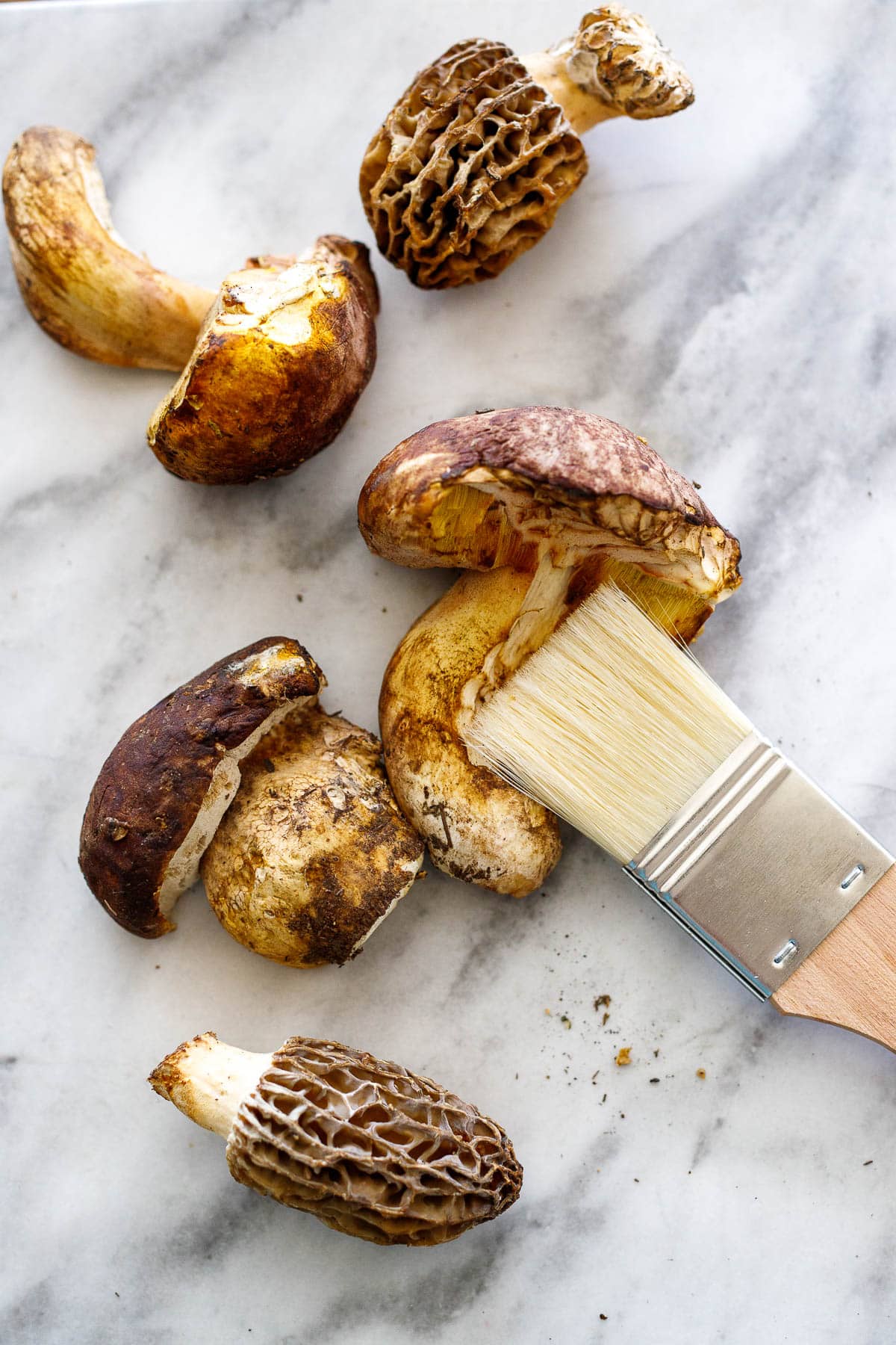 cleaning mushrooms with a brush