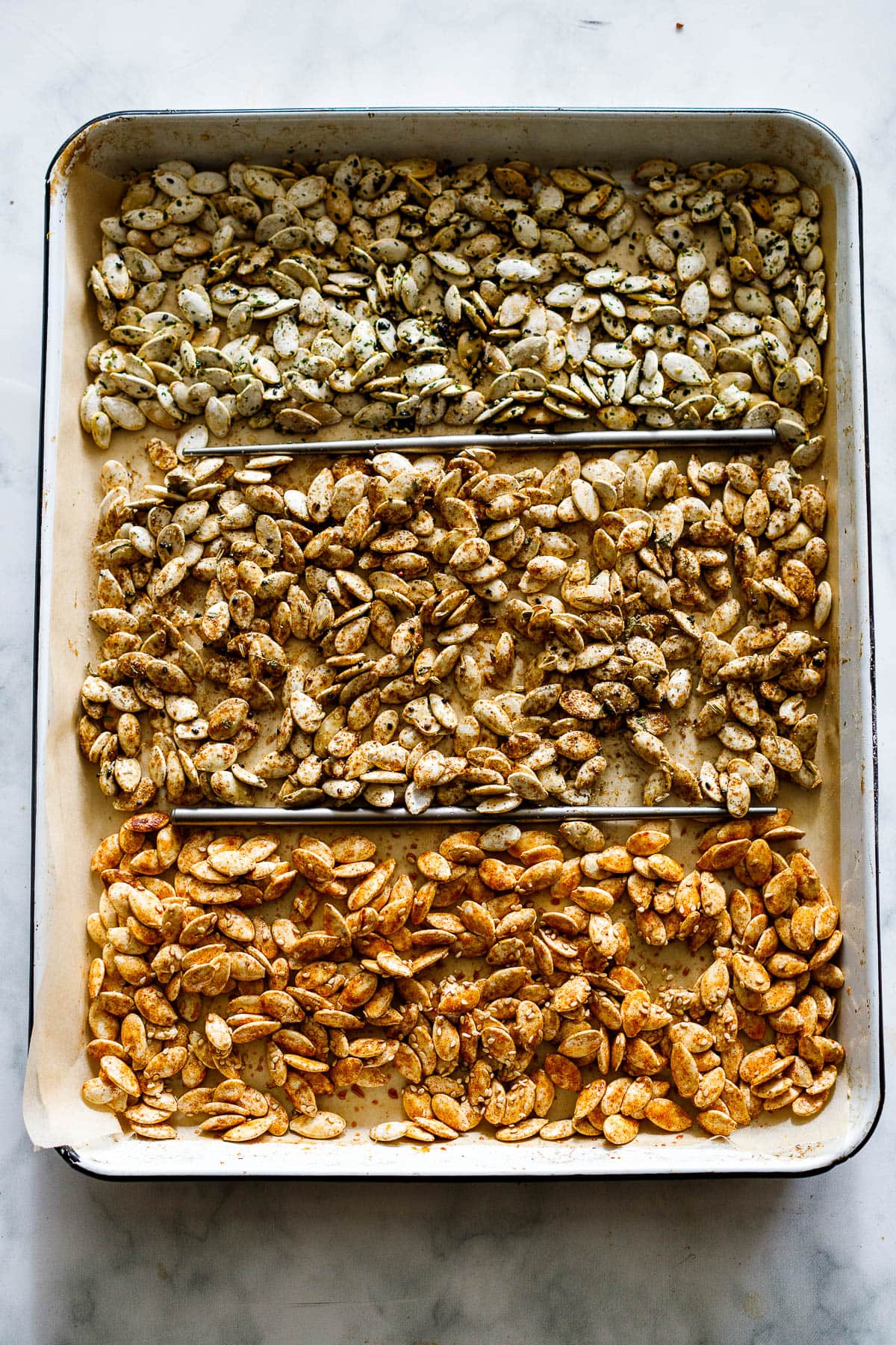 variations on pumpkin seed flavors on one sheet pan