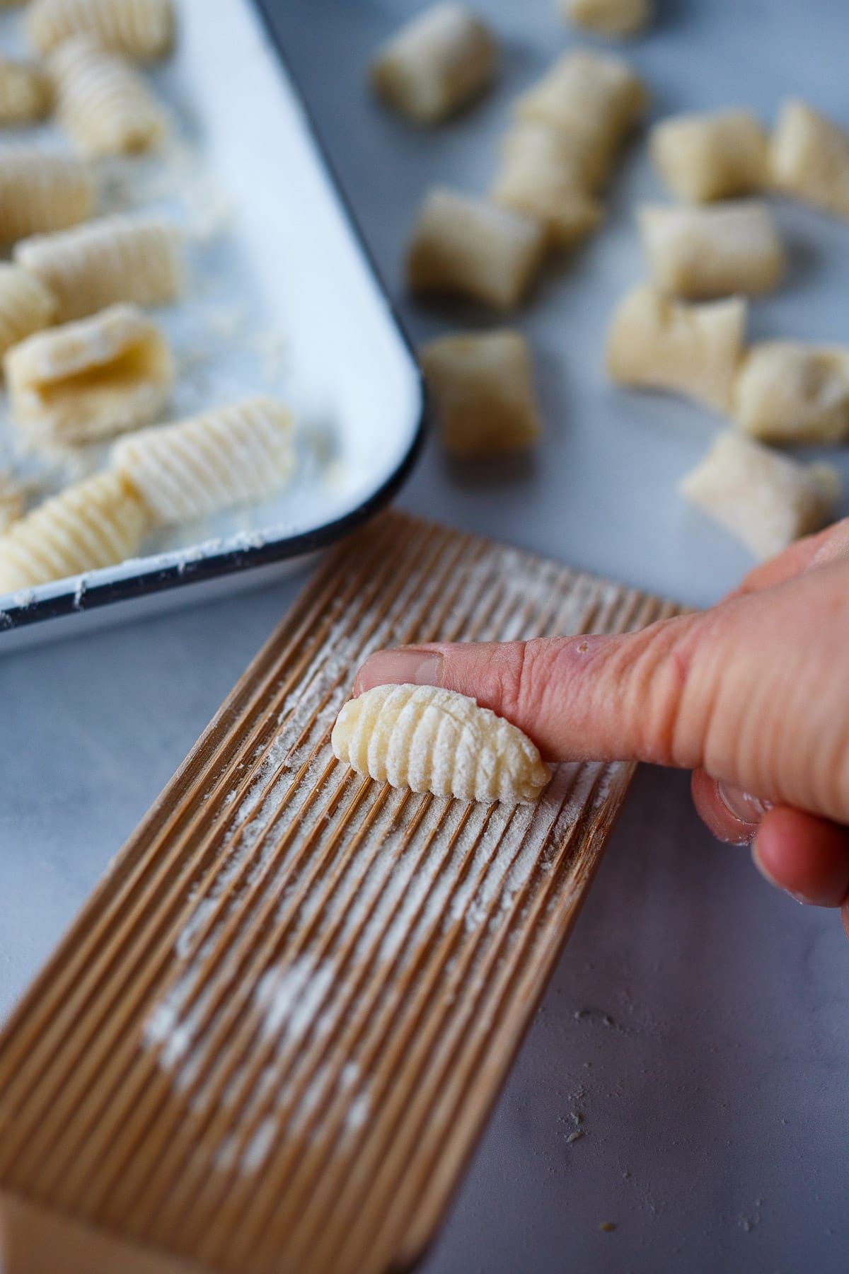 Shaping gnocchi.