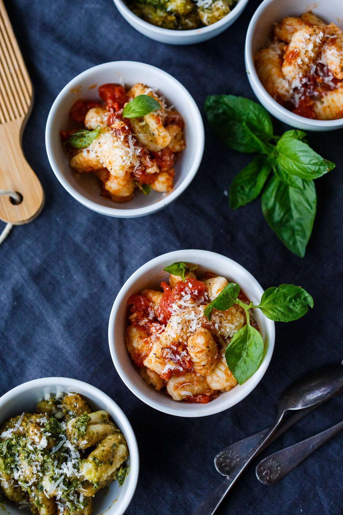 Homemade potato gnocchi! Just four simple ingredients result in the dreamiest little dumplings.  They are actually easier to make then you may think and so much more delicious than store-bought. From baked and sautéed to boiled you'll find so many ways to use them! 