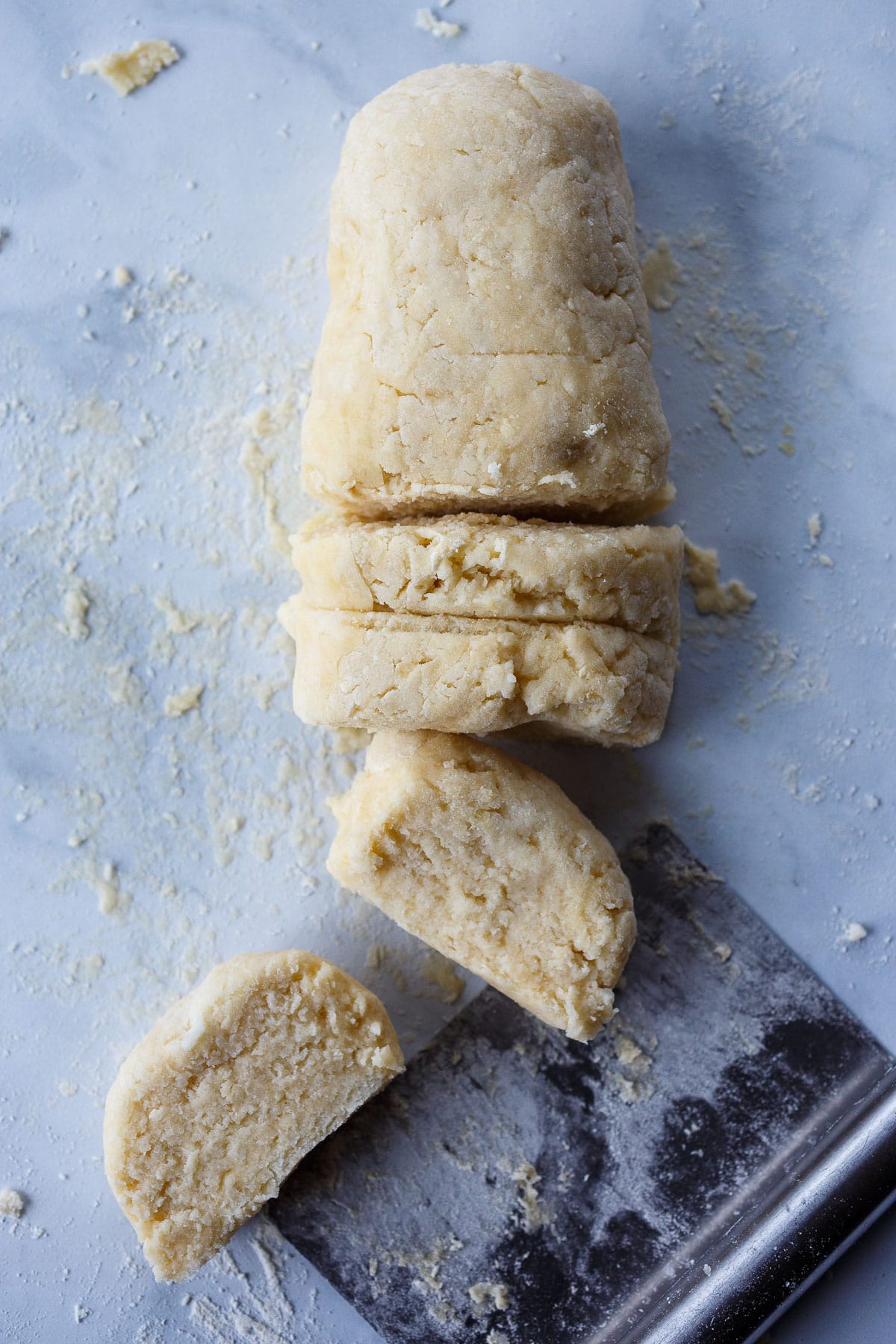 Forming dough into a large long, cut into 8 pieces.