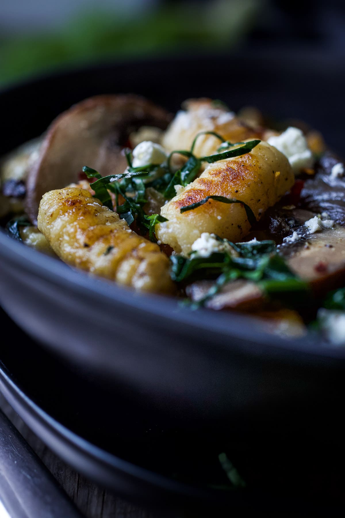 Caramelized fennel, sautéed mushrooms and wilted spinach combine perfectly with pan-seared potato gnocchi, a quick vegetarian dinner!