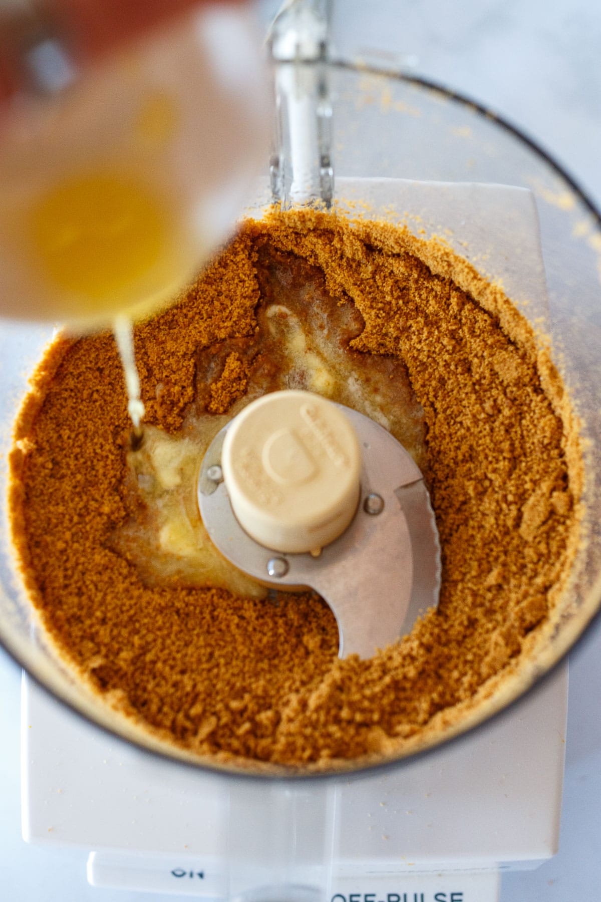 Making the ginger cookie crust.