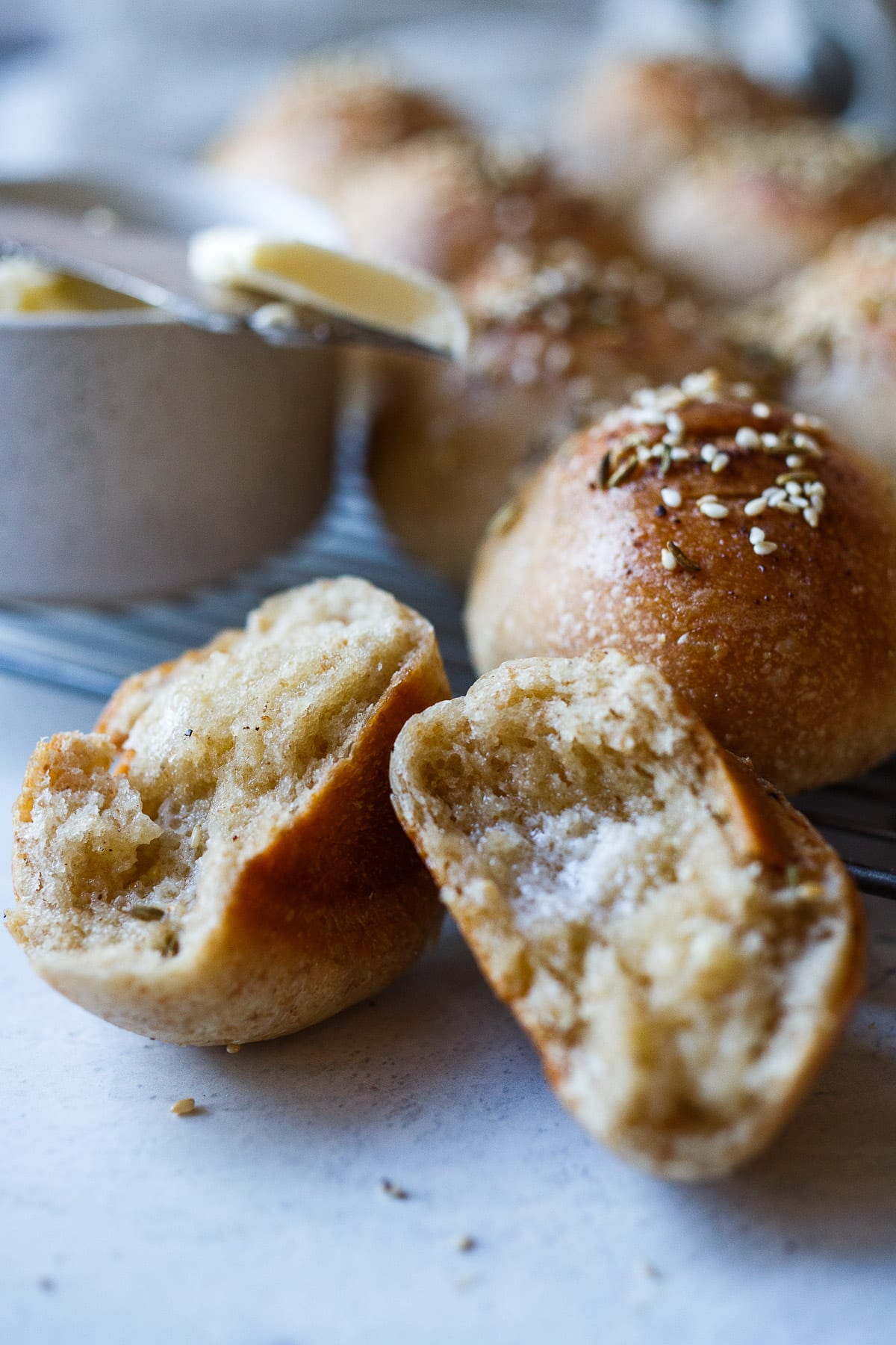 Flavorful, tender sourdough rolls made with sourdough starter, no yeast. Make in one day or refrigerate overnight. They freeze well and are vegan-adaptable!