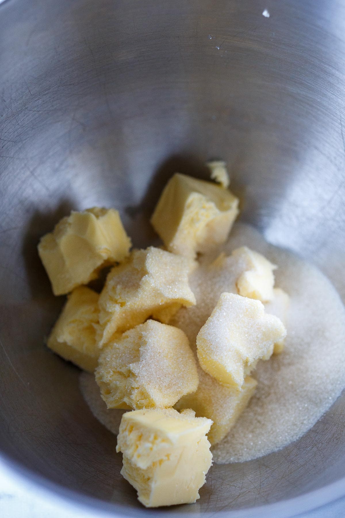 Butter and sugar in kitchen aid mixer bowl.