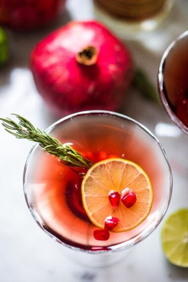 This Pomegranate Martini is infused with a Rosemary Simple Syrup -a refreshing and festive holiday cocktail made with vodka (or gin) and Pomegranate Juice!