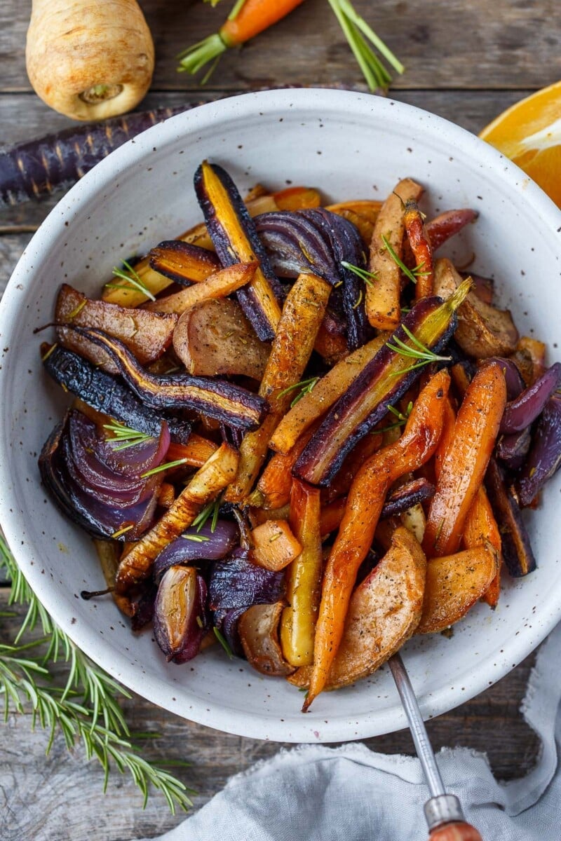 roasted Root vegetables recipe- in a whit bowl.