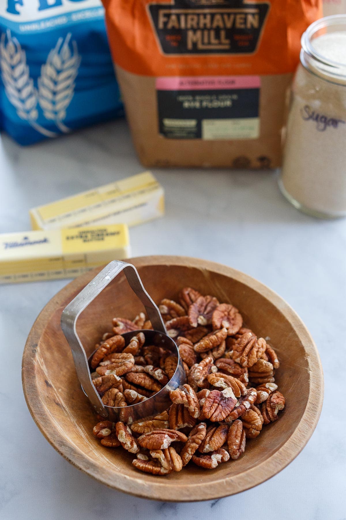 Pecans, butter, flour and sugar.