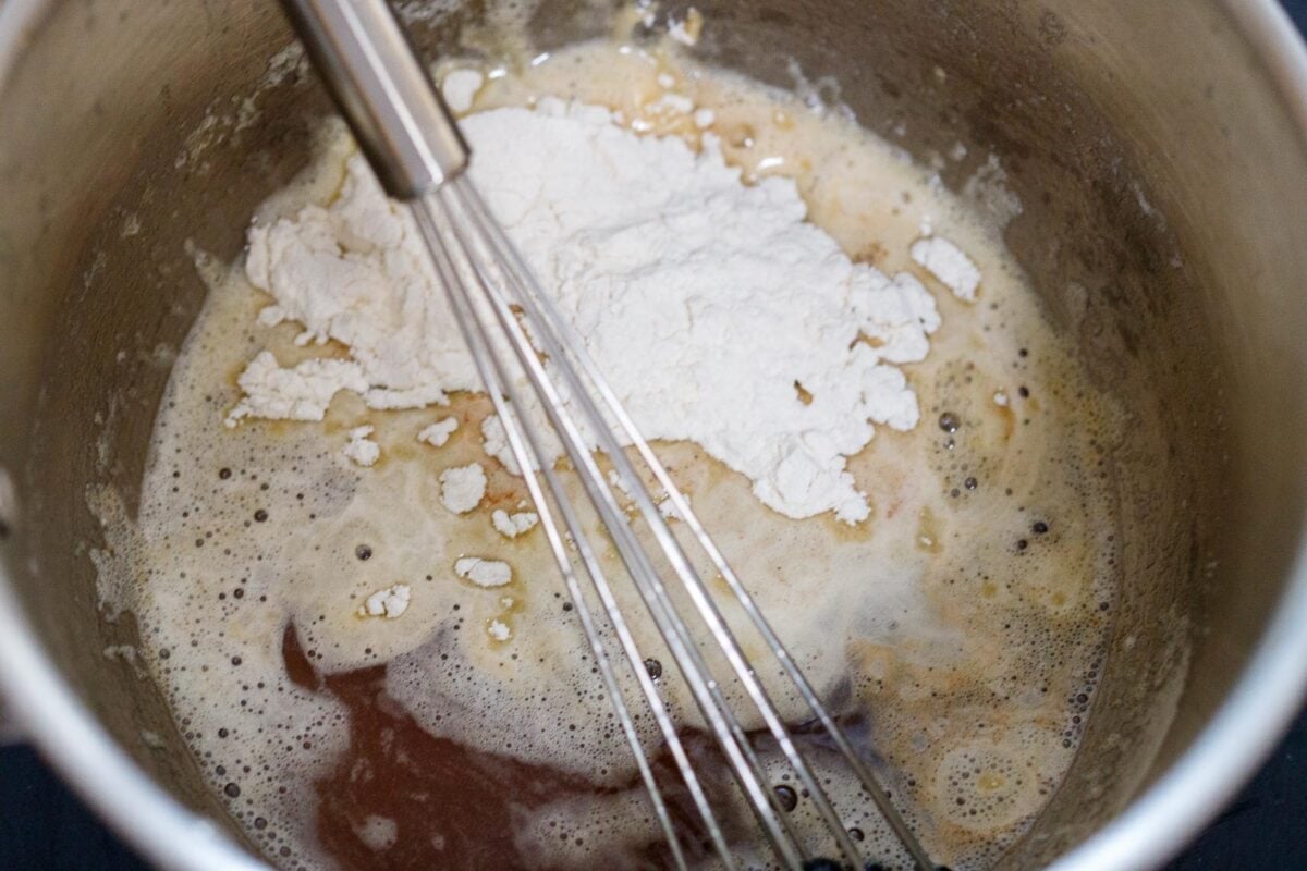 Adding flour to the browned butter.