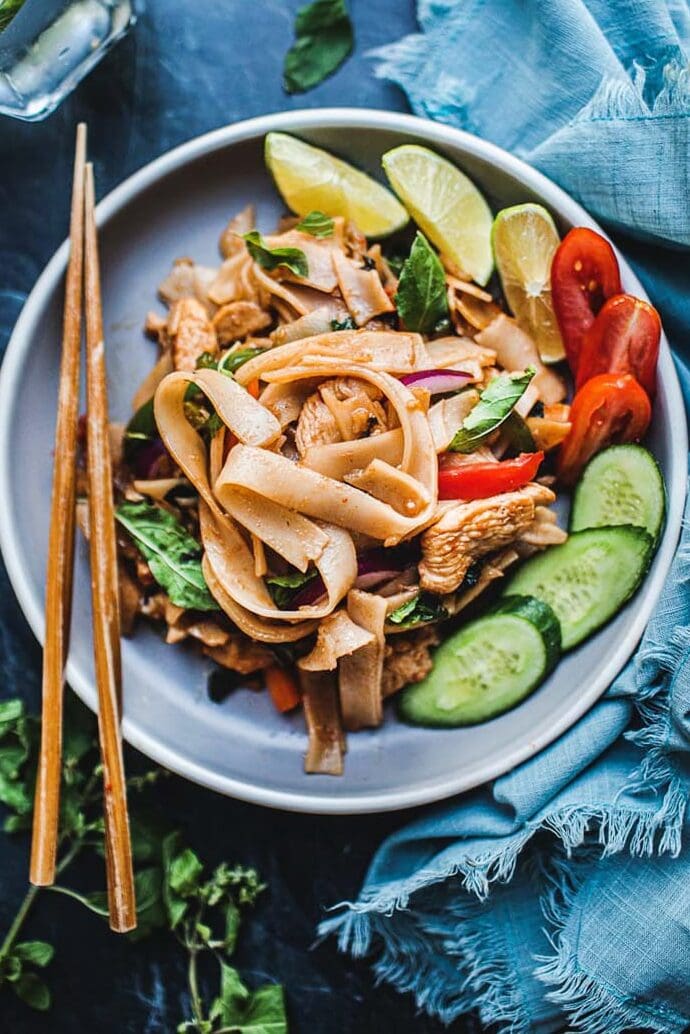 Thai Drunken Noodles are not only the perfect hangover cure, but these saucy stir-fried rice noodles are a fast, easy, 30-minute weeknight dinner! Full of umami flavor, make it with chicken, shrimp or crispy tofu! 