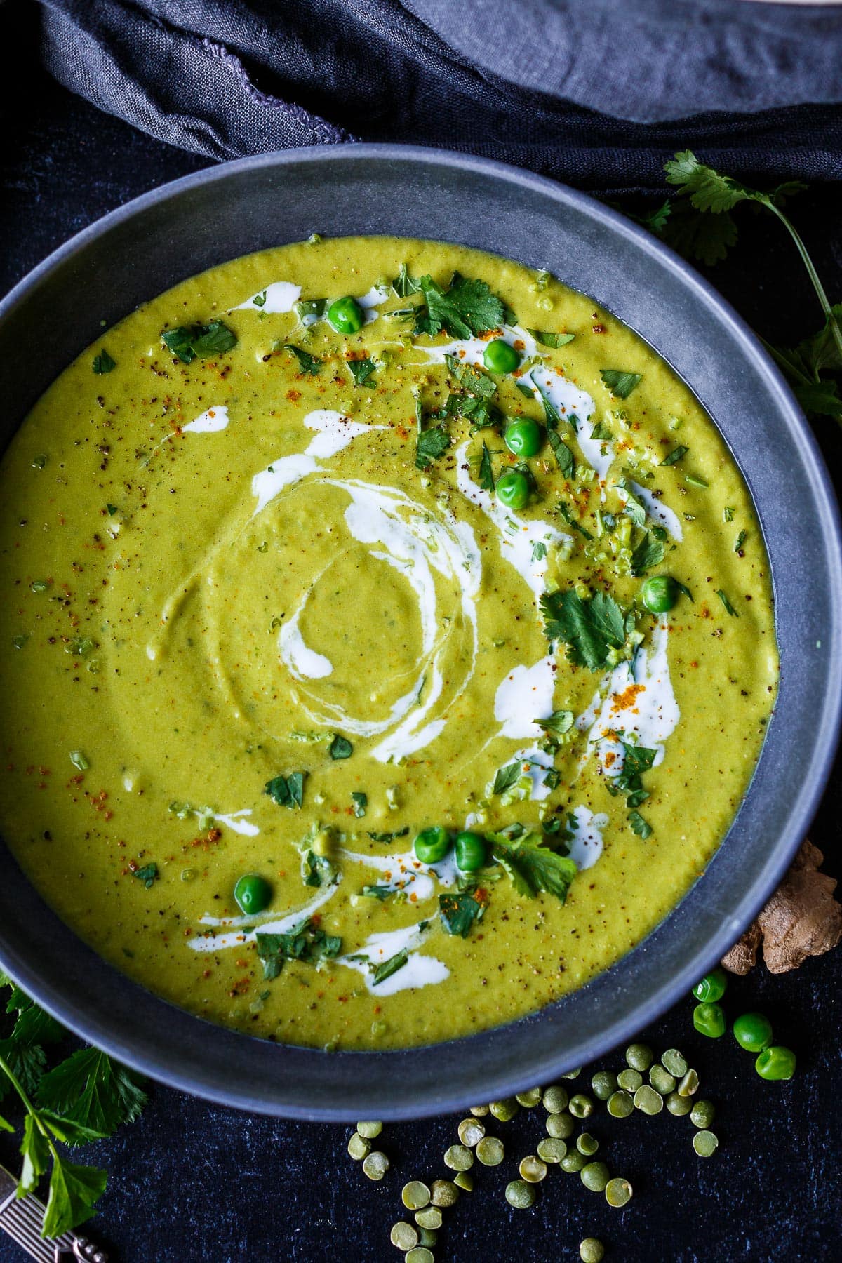 This Curried Split Pea Soup is a fresh take on the traditional. Creamy and delicious, enhanced with yellow curry, coconut milk and fresh peas.