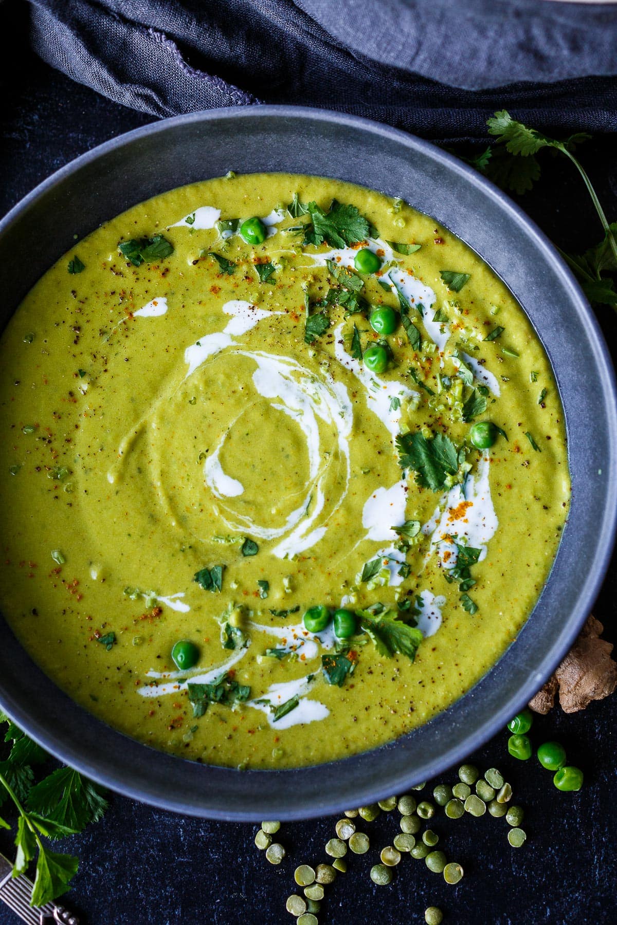 This Curried Split Pea Soup is a fresh take on the traditional. Creamy and delicious, enhanced with yellow curry, coconut milk and fresh peas. 