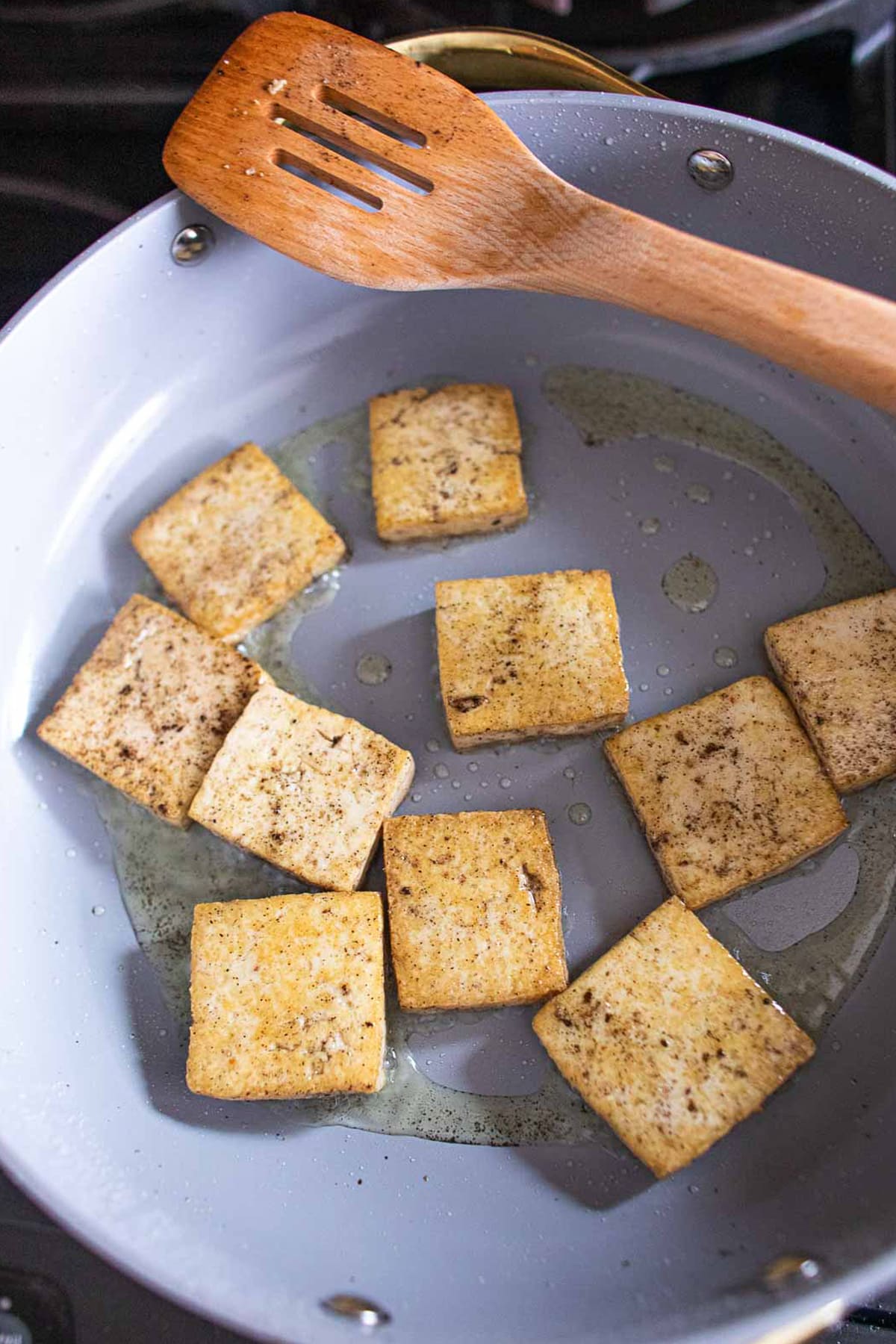 Crisp  tofu in a pan for tom yum soup.