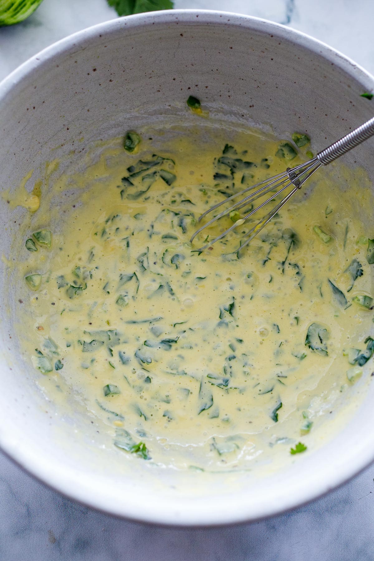 Whisk wet ingredients together in a bowl.