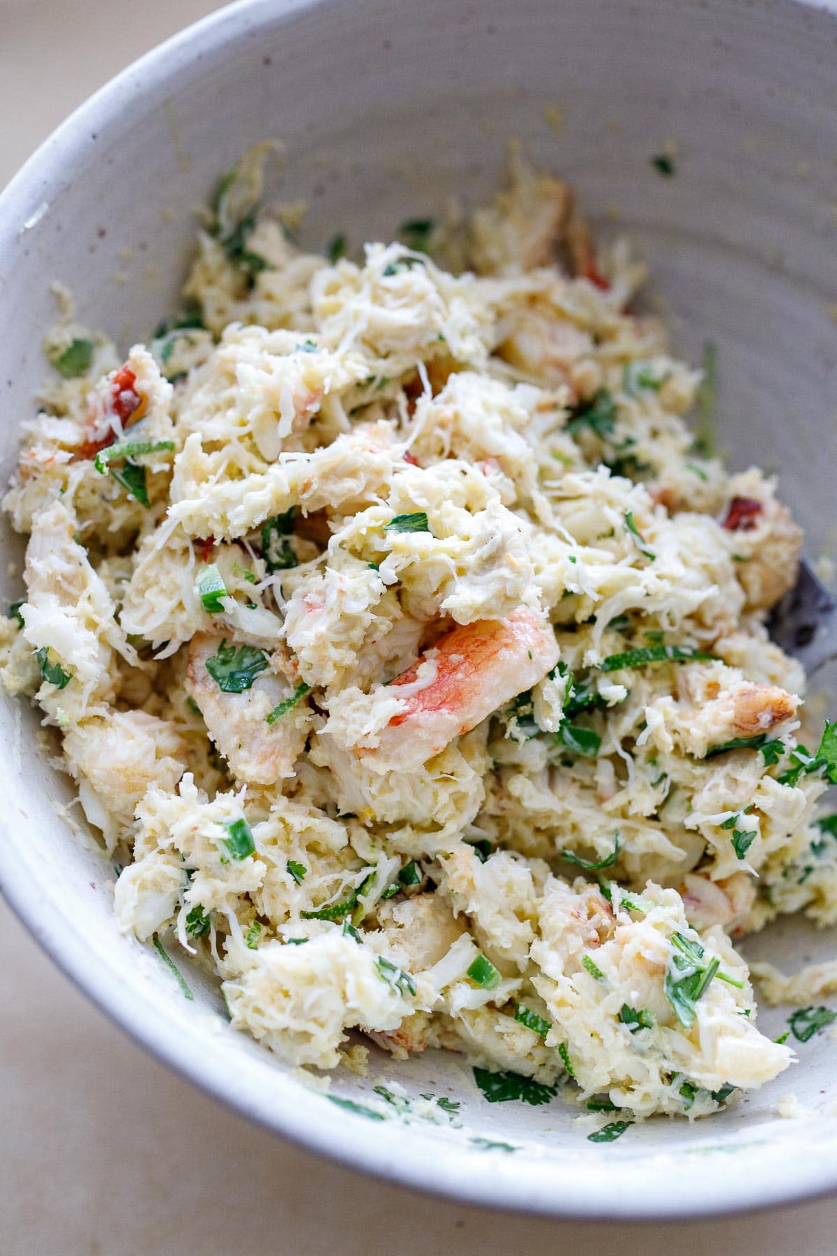 Crab cake mix in a bowl.