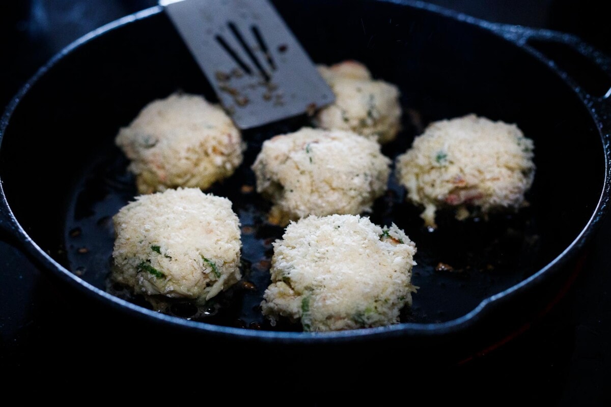 Searing the crab cakes. 