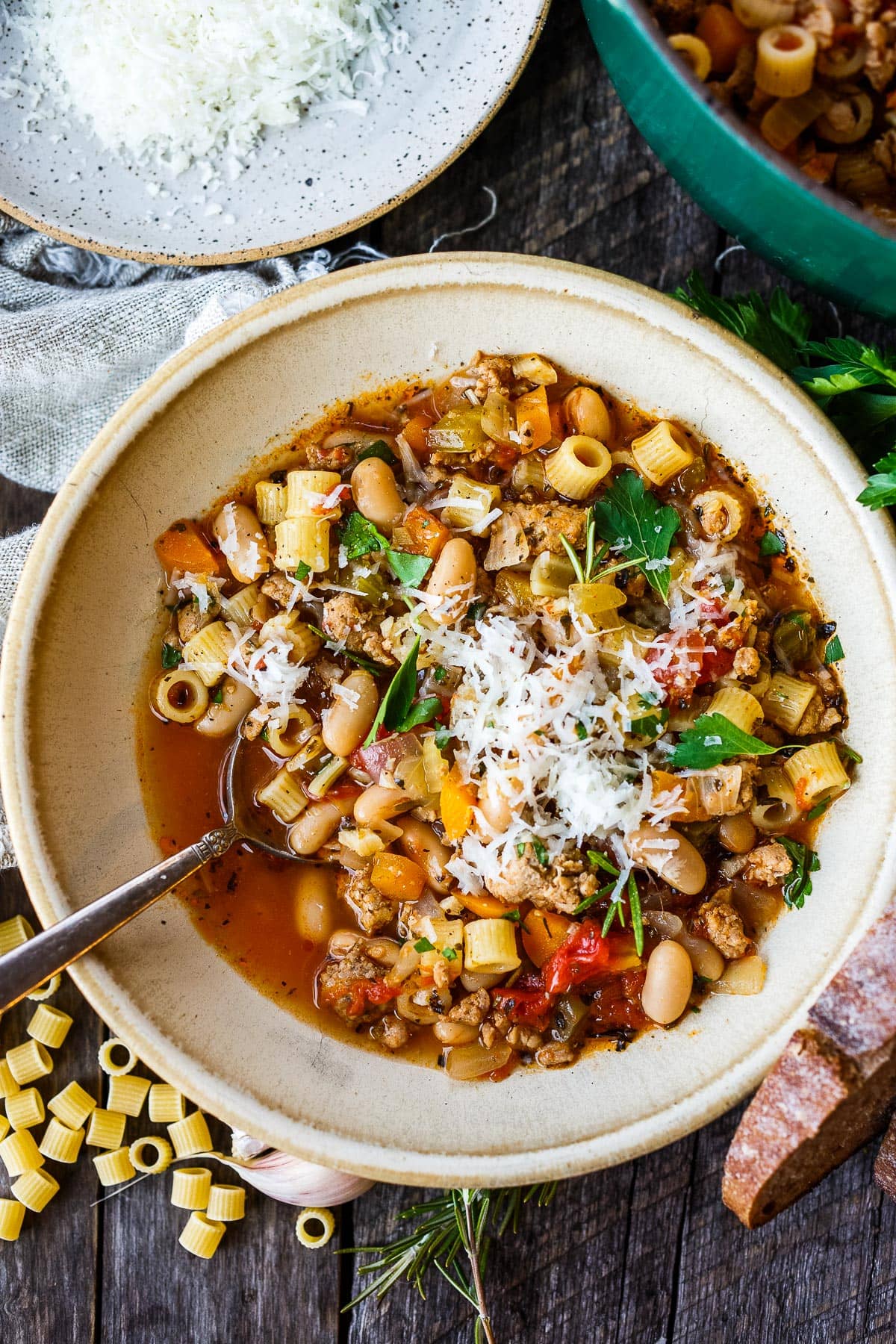 Pasta Fagioli in a bowl with a spoon.