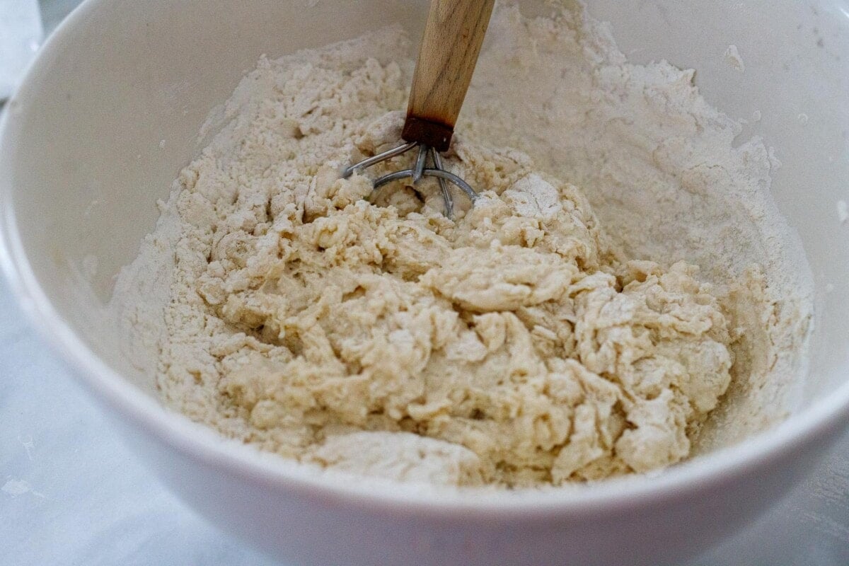 Mixing the flour water and sourdough starter.