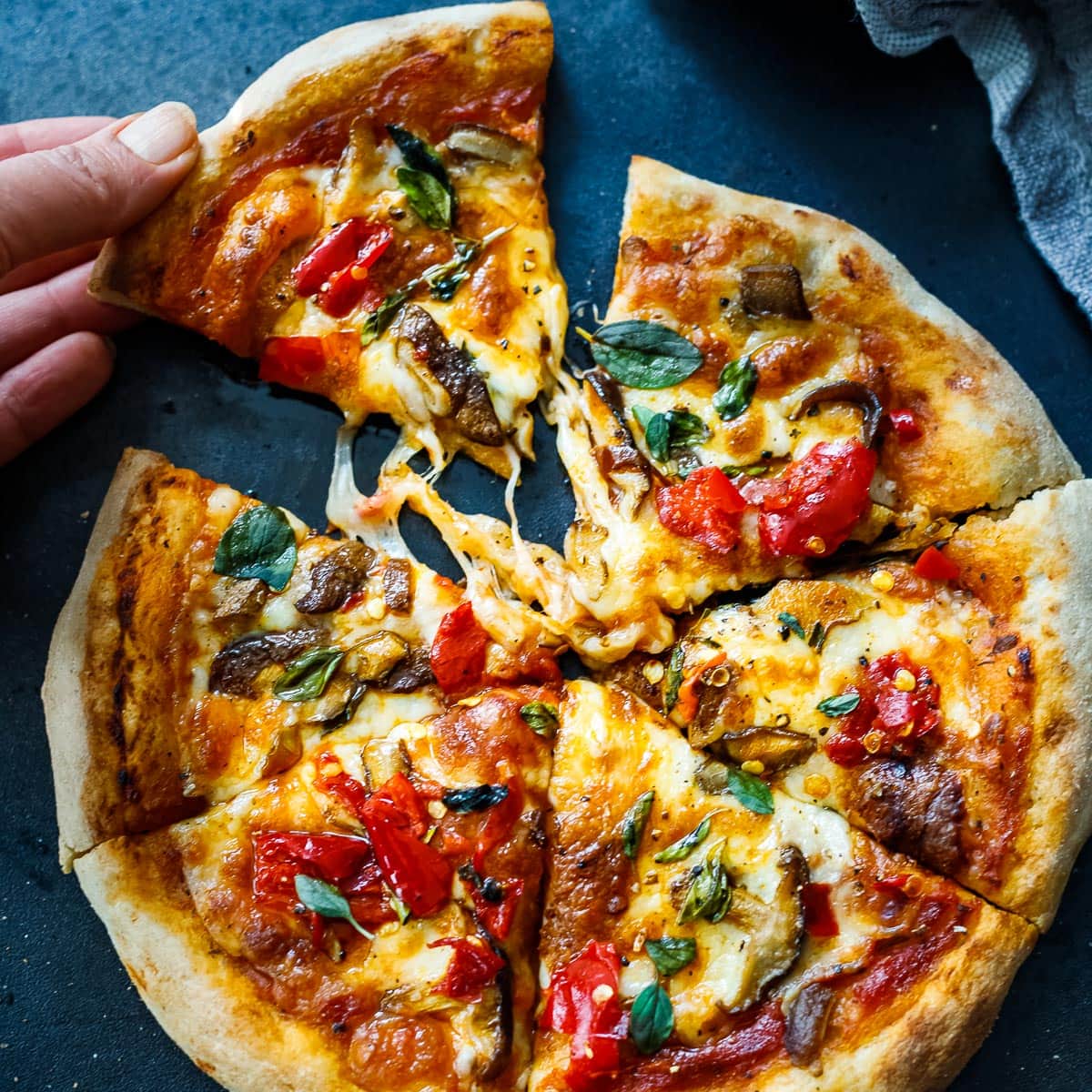 https://www.feastingathome.com/wp-content/uploads/2023/02/sourdough-pizza-crust.jpg