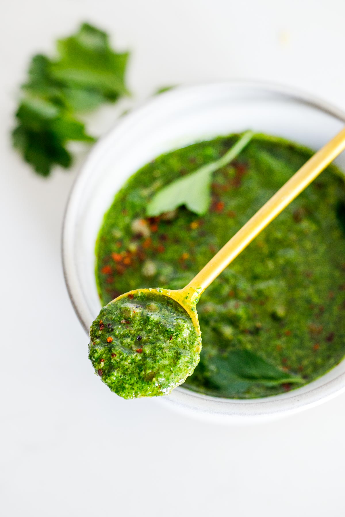 Give your meals a a punch of flavor with Italian Salsa Verde! This flavorful herby green sauce has  delicious depth of flavor from anchovies & capers. Delicious with fish, veggies, or meat. 