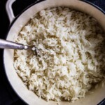 Fluffy fragrant Jasmine Rice cooked to perfection! A no fuss easy stove top recipe that is ready in under 30 minutes from start to finish.