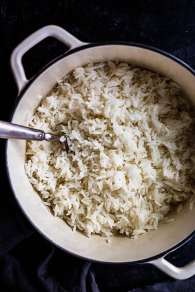 Fluffy fragrant Jasmine Rice cooked to perfection! A no fuss easy stove top recipe that is ready in under 30 minutes from start to finish.