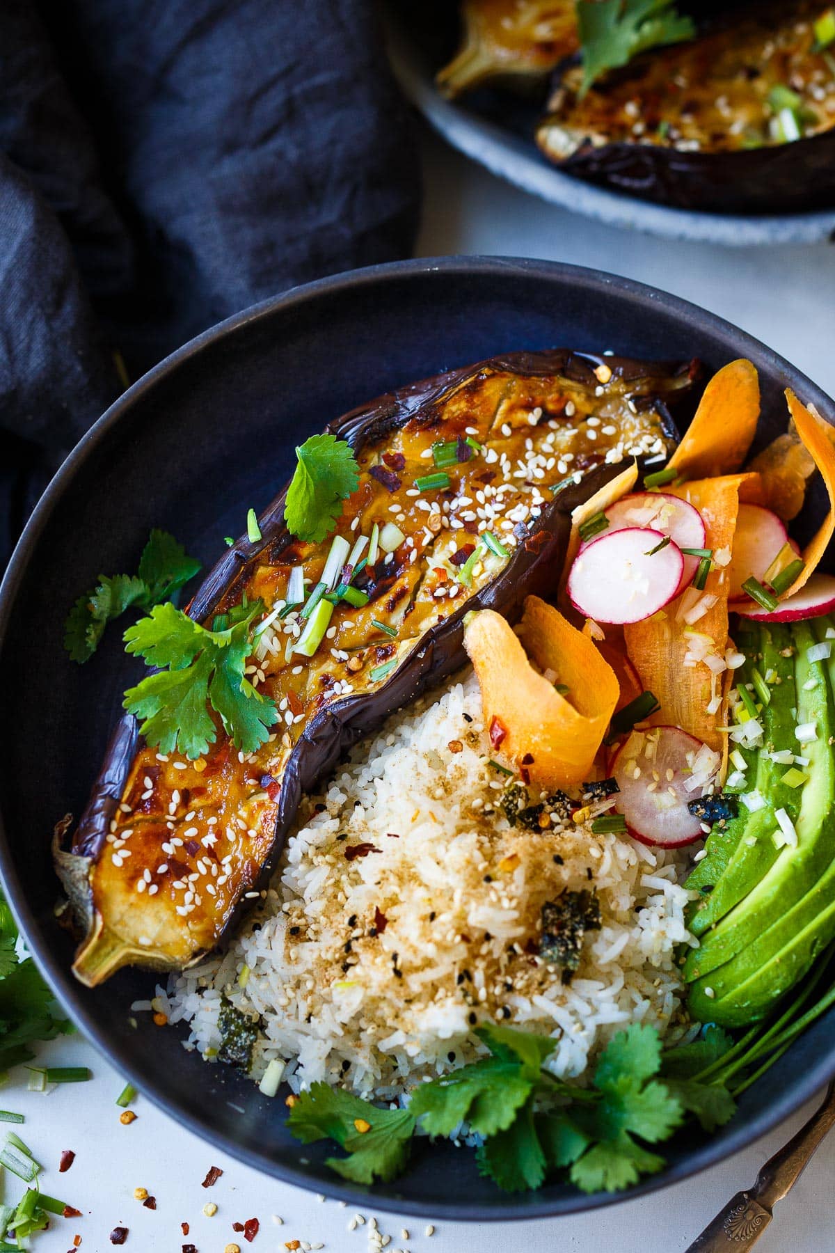 Miso Roasted Eggplant (Nasu Dengaku) is caramelized with an umami rich miso glaze, a simple vegan main dish or vegetable side dish that is easy and so savory. 