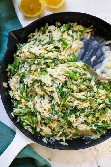 This orzo recipe is a delicious spring meal! An easy dinner under 30 minutes, packed with asparagus, and bright lemon flavor.