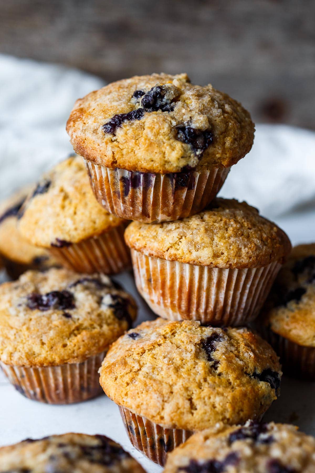 Tender blueberry muffins with lemon zest, vanilla and cardamom, lightly sweetened and made with fresh or frozen blueberries.  Gluten free customizable.  A delicious breakfast or an afternoon snack.  Gluten free customizable.