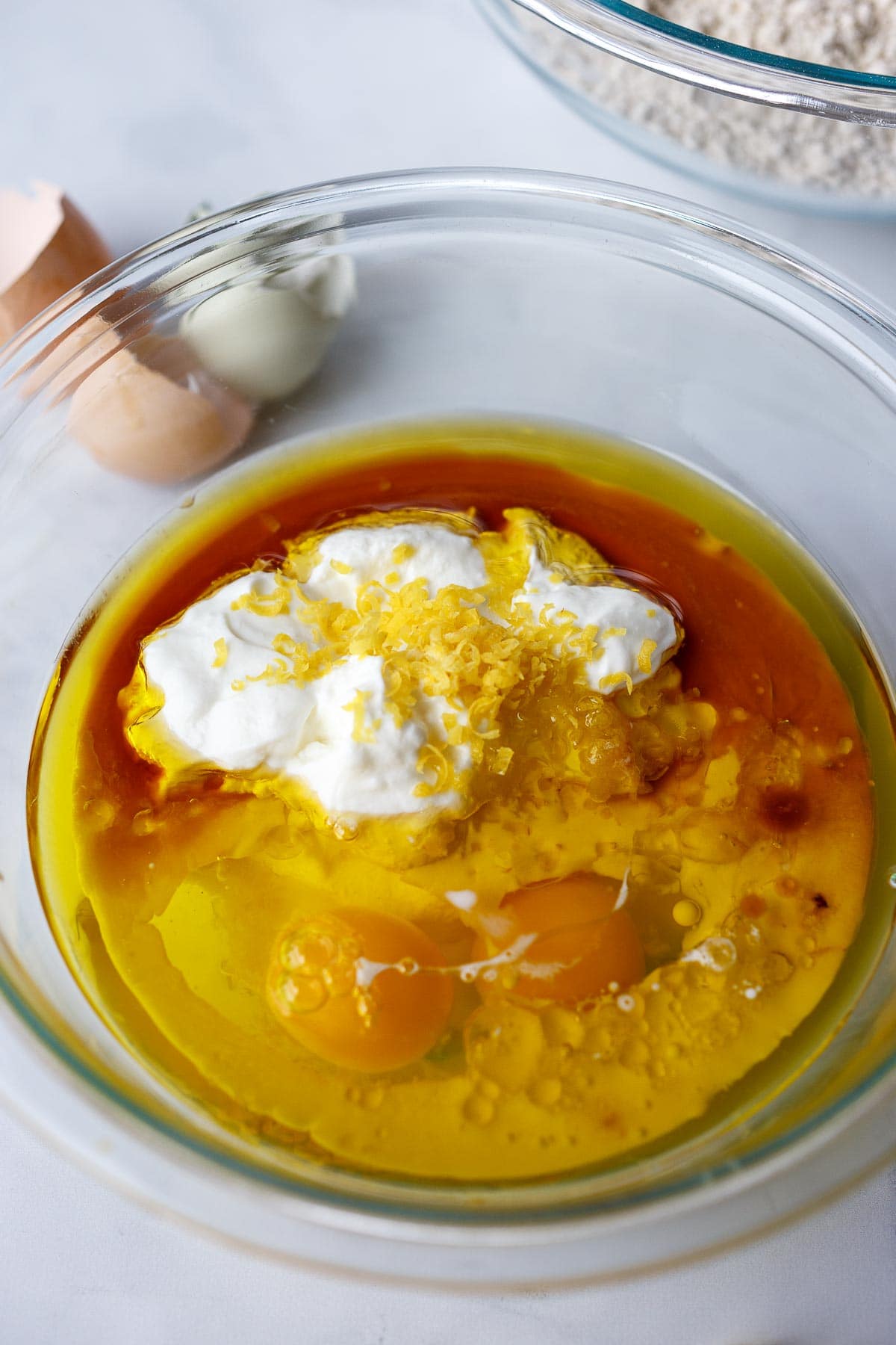 Wet ingredients in a glass bowl.