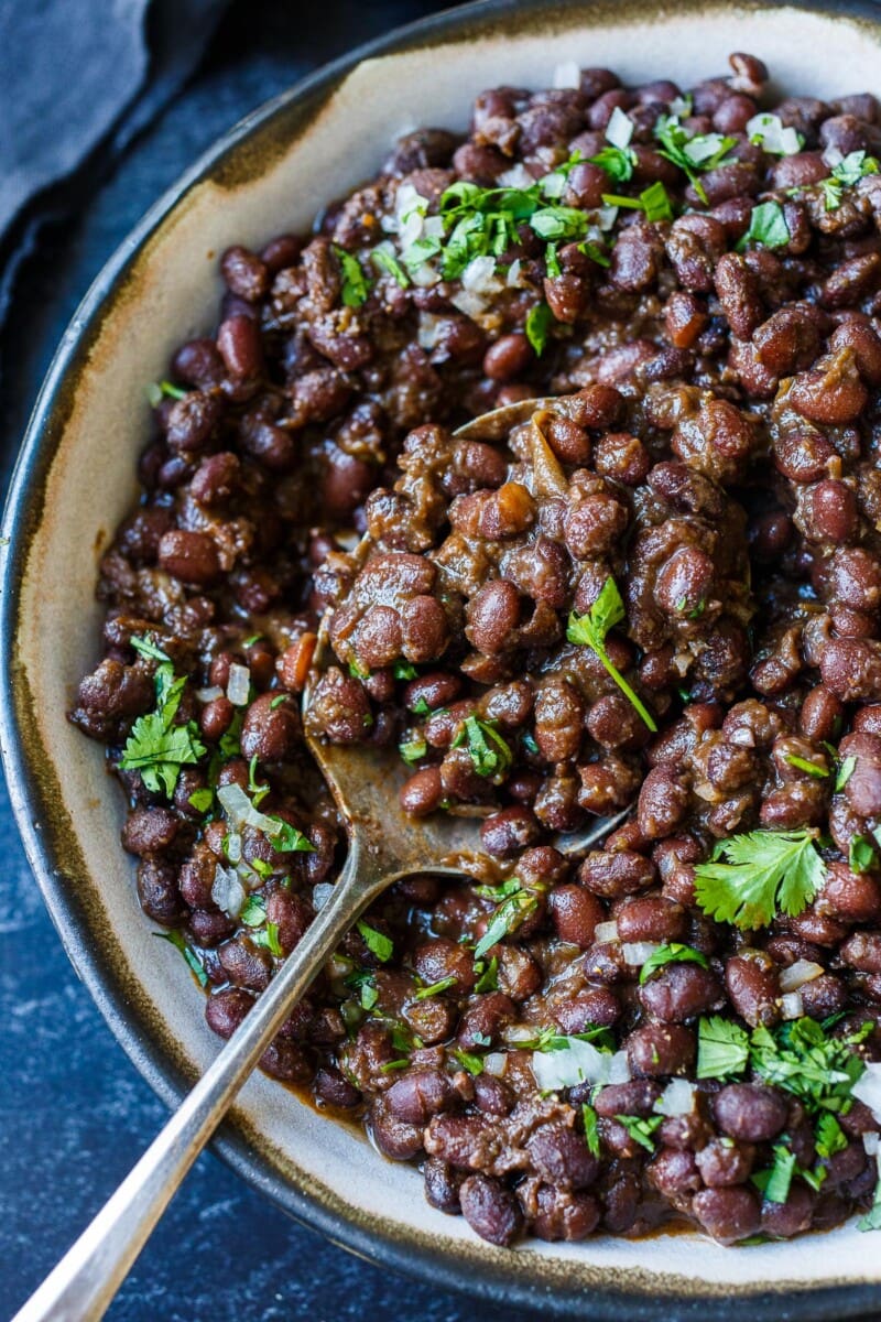 Full of savory flavor, these Cuban Style Black Beans are made with dry black beans and simple seasonings. A healthy side dish that will complement many dishes. The recipe card includes instructions for Stove Top, Instant Pot, and canned beans. Vegan!