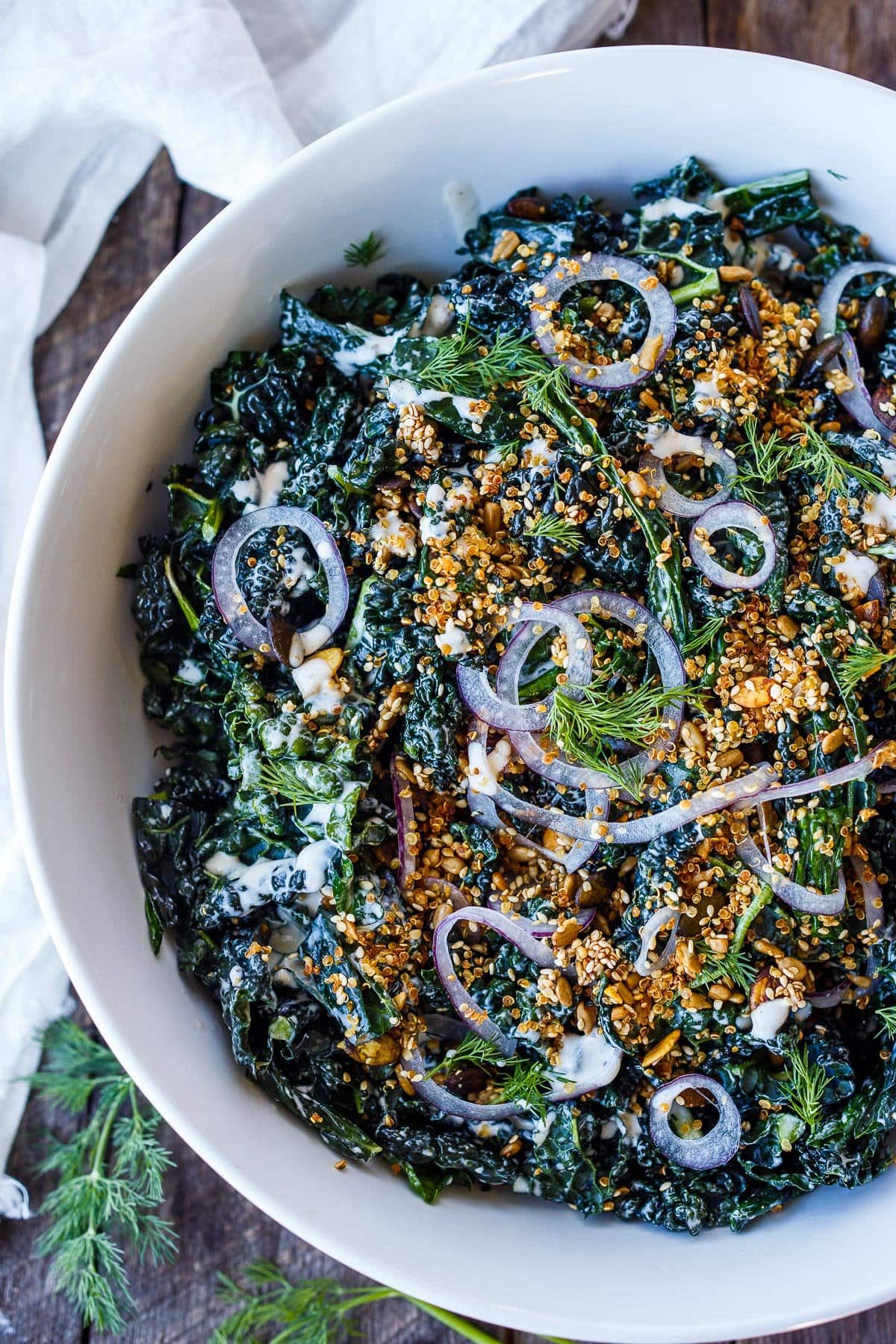 Kale Salad with red onions, herbs, buttermilk dressing and crunchy salad topper. 