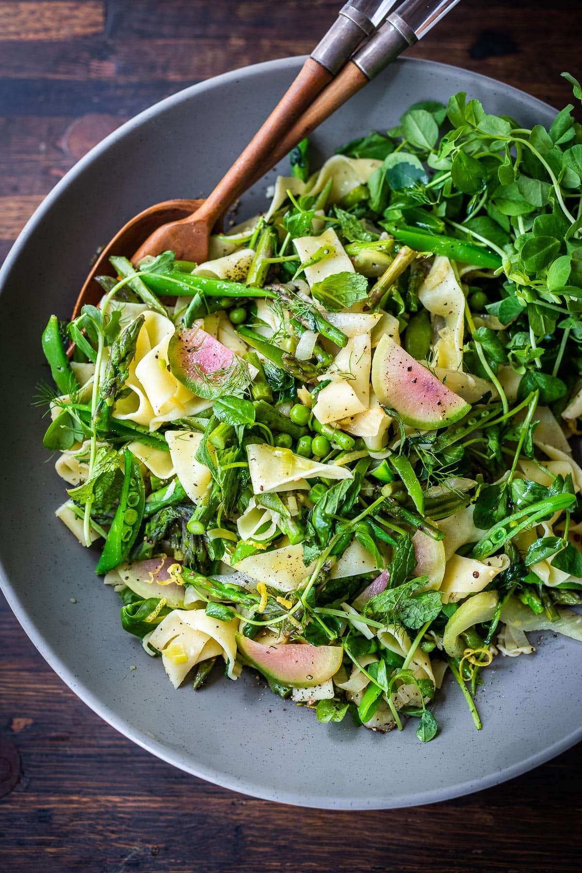 Pasta Primavera or "Spring Pasta" highlights tender spring vegetables-asparagus, peas, leeks and pea shoots, tossed with pappardelle, lemon zest, olive oil and spring herbs.