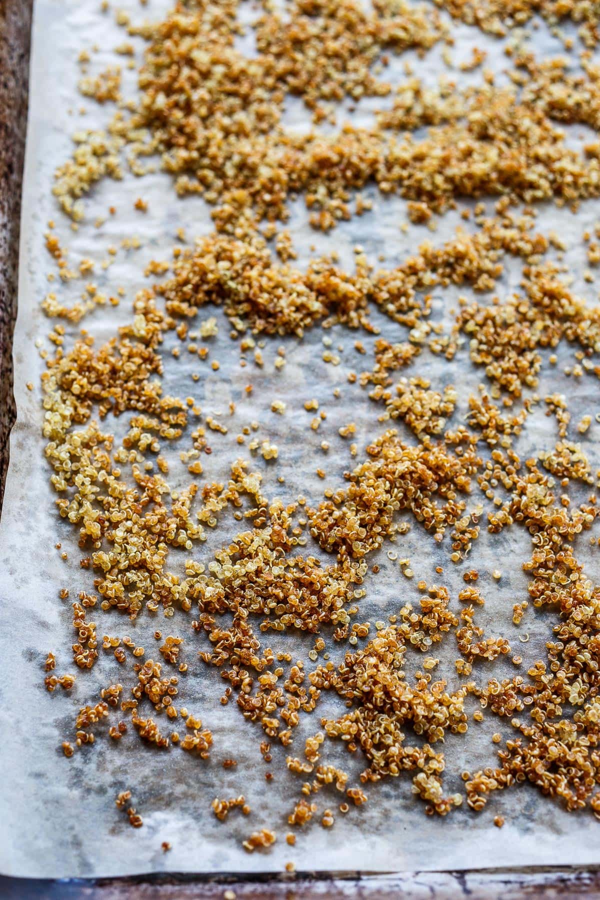 Toasted quinoa on a pan.
