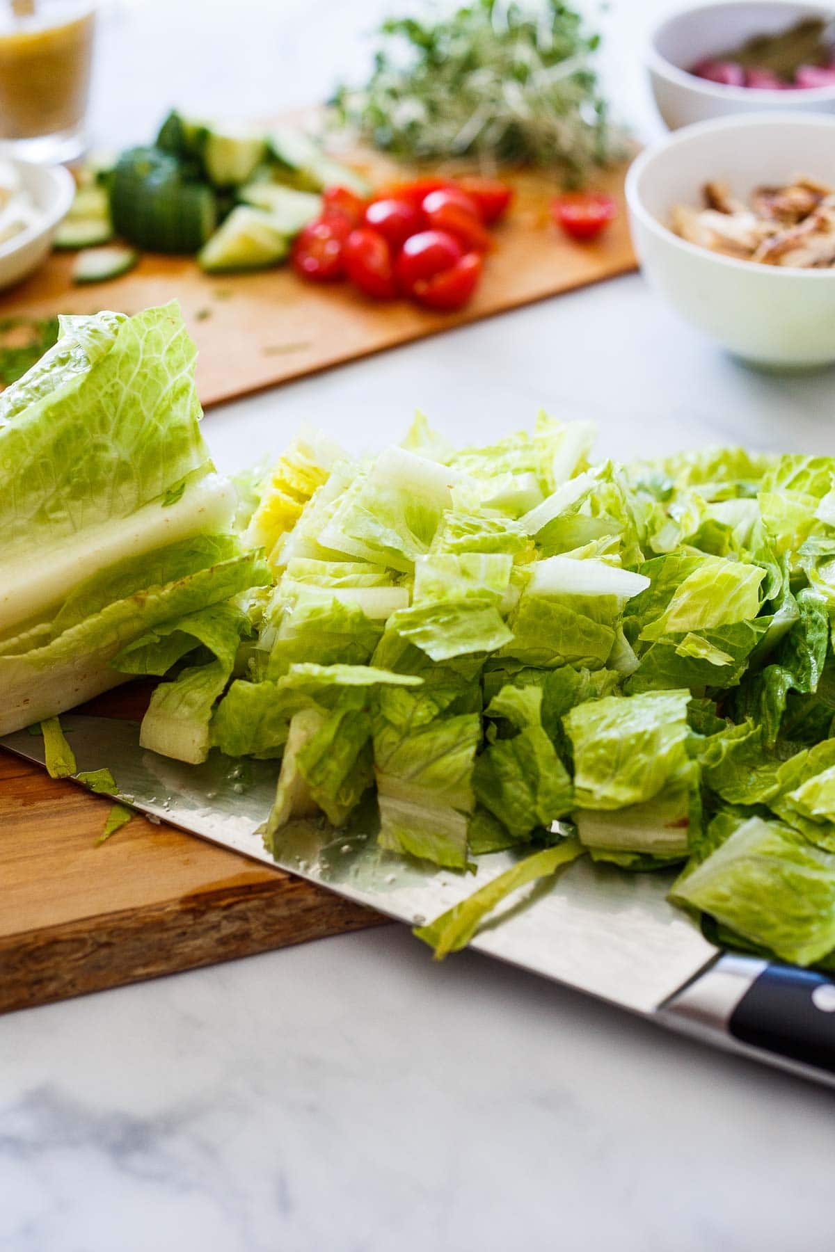 Chopping ingredients for Cobb Salad.