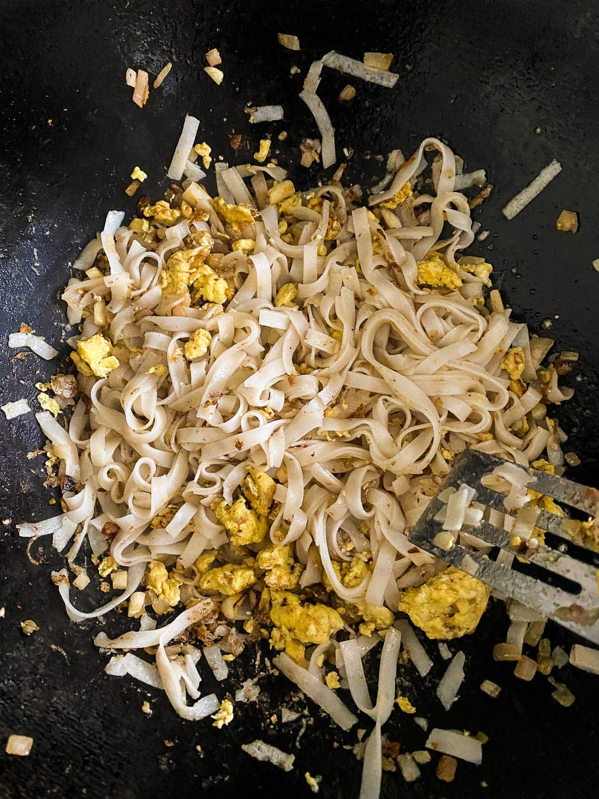 stir fry the rice noodles. 