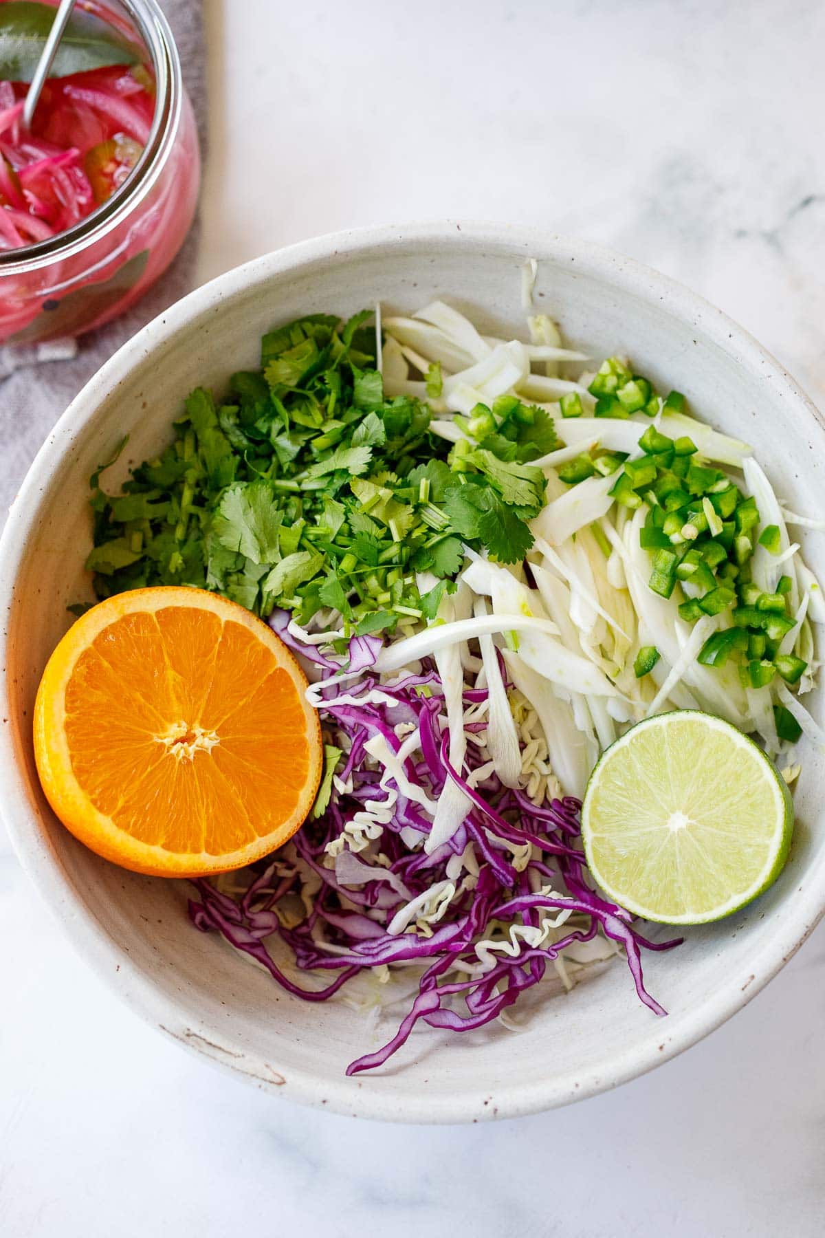 Citrus infused slaw in a bowl.