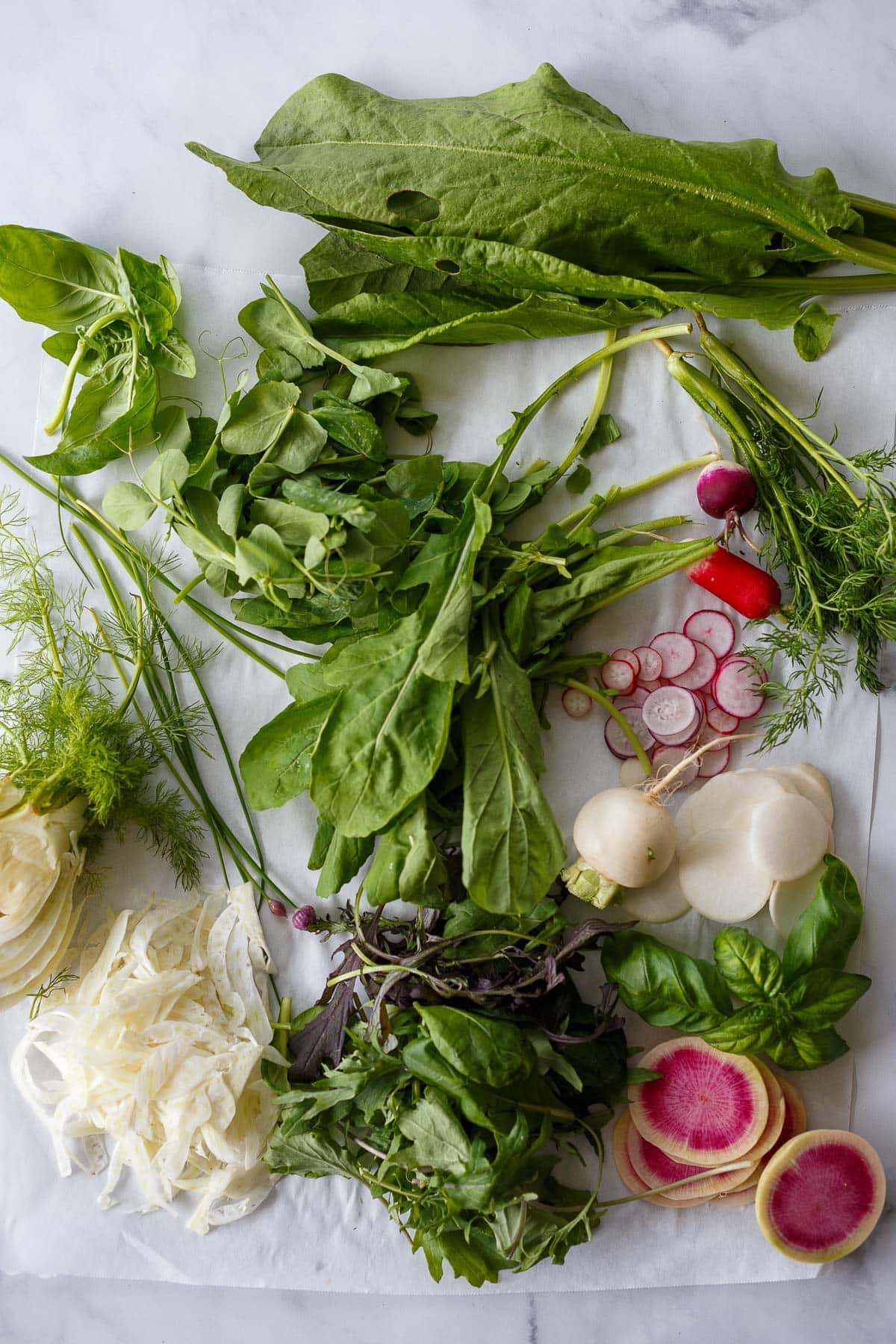 Chopped ingredients for the  spring salad recipe.