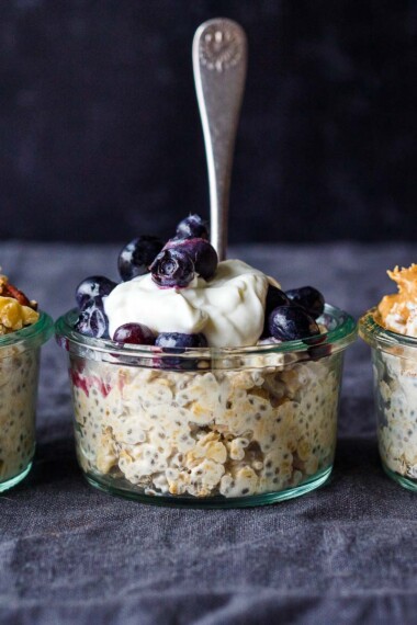 overnight oats in jars with a spoon