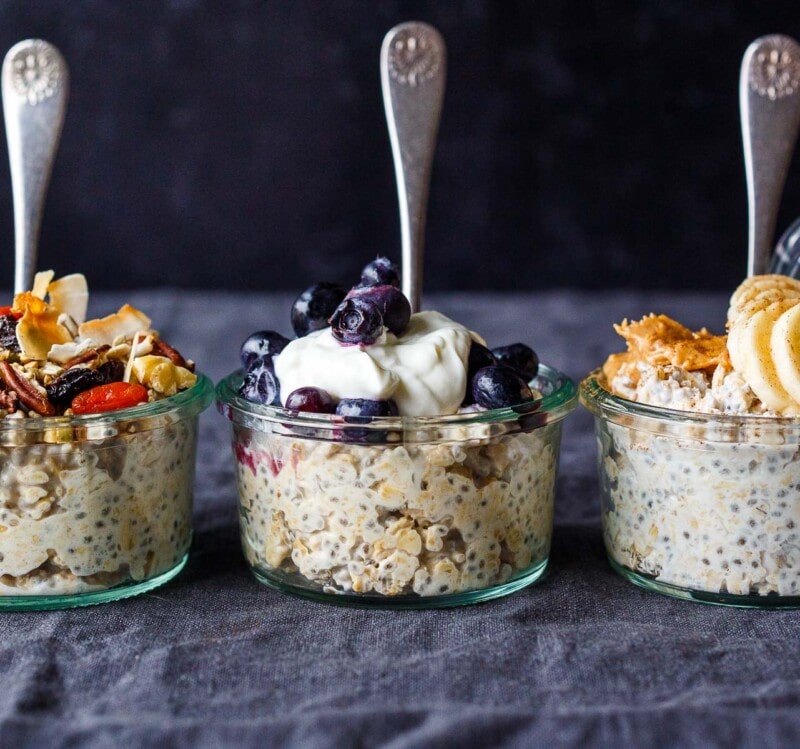 overnight oats in jars with a spoon