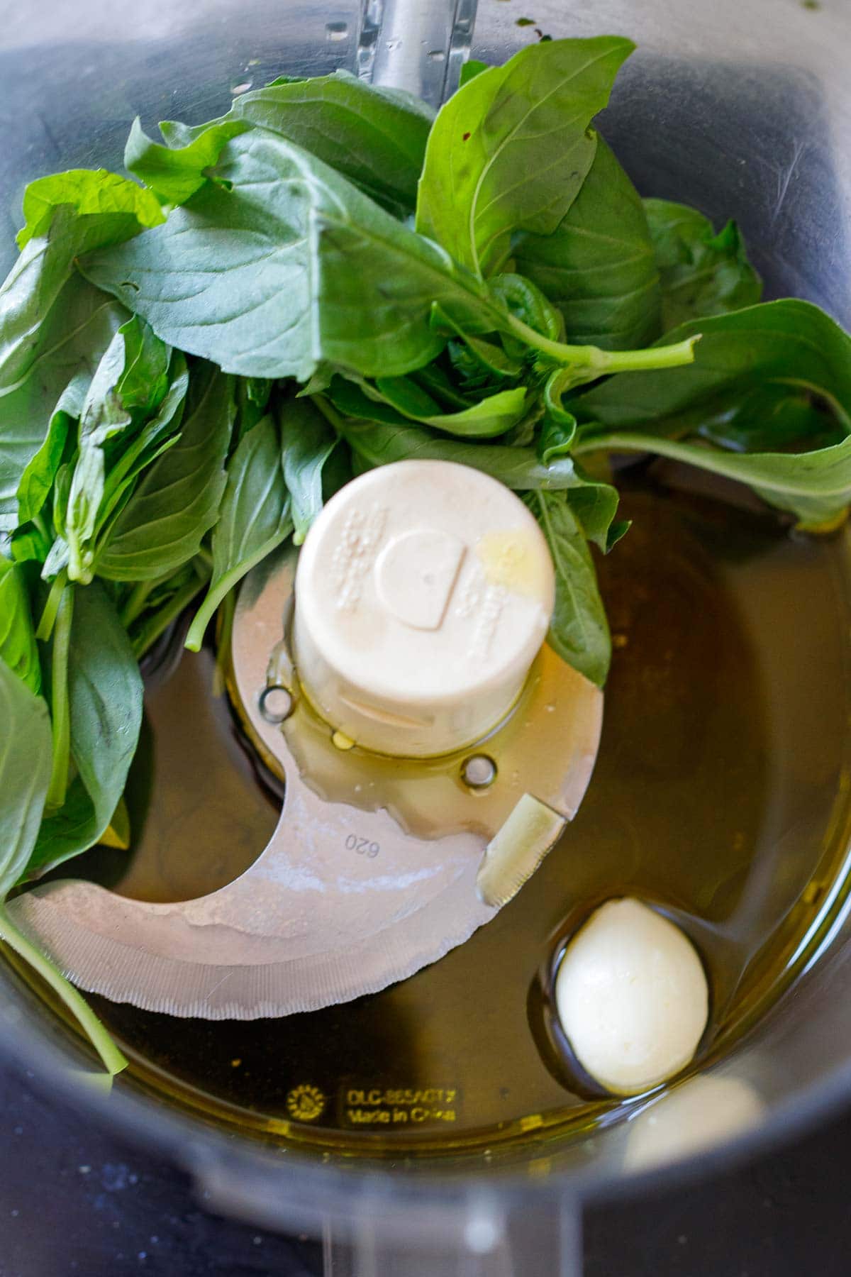 fresh basil, garlic olive oil in a food processor.