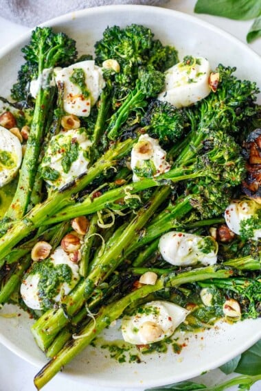 broccolini with burrata, hazelnuts and basil oil.