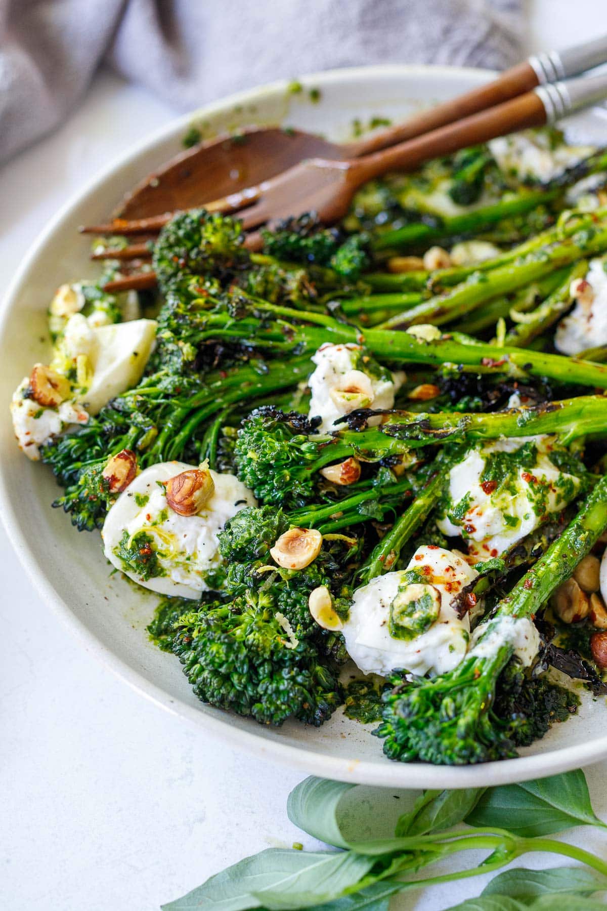 Grilled Broccolini with burrata cheese, toasted hazelnuts and basil oil- a tasty summer side dish perfect for outdoor dinners and gatherings. 