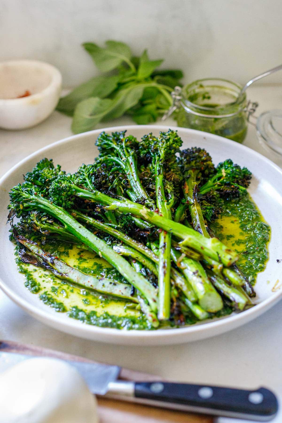 Plating the broccolini.