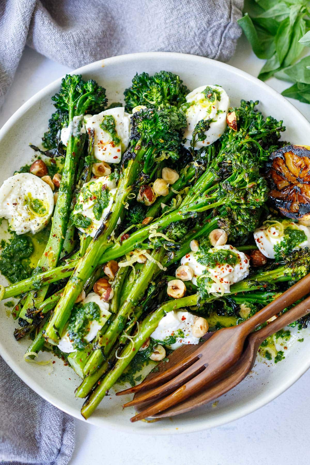 Grilled Broccolini with burrata, hazelnuts and basil oil- a tasty summer side dish perfect for outdoor dinners and gatherings. 