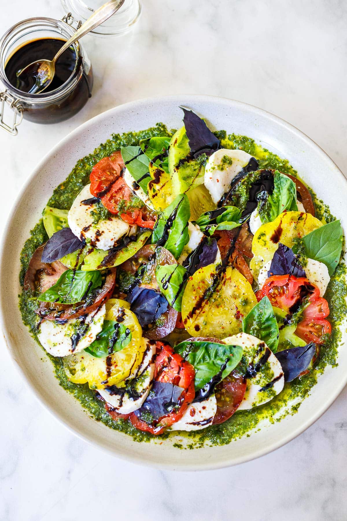 Caprese salad with a balsamic glaze.